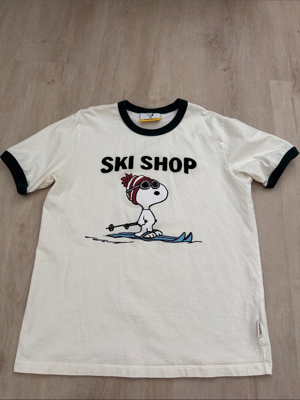 Peanuts Cream Ringer Tee with Black Trim and Multicolor Snoopy Graphic